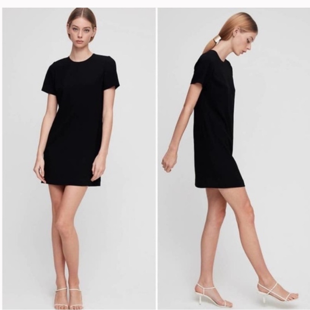 • Aritzia Babaton • Women’s Patricio Black Mini Dress
4